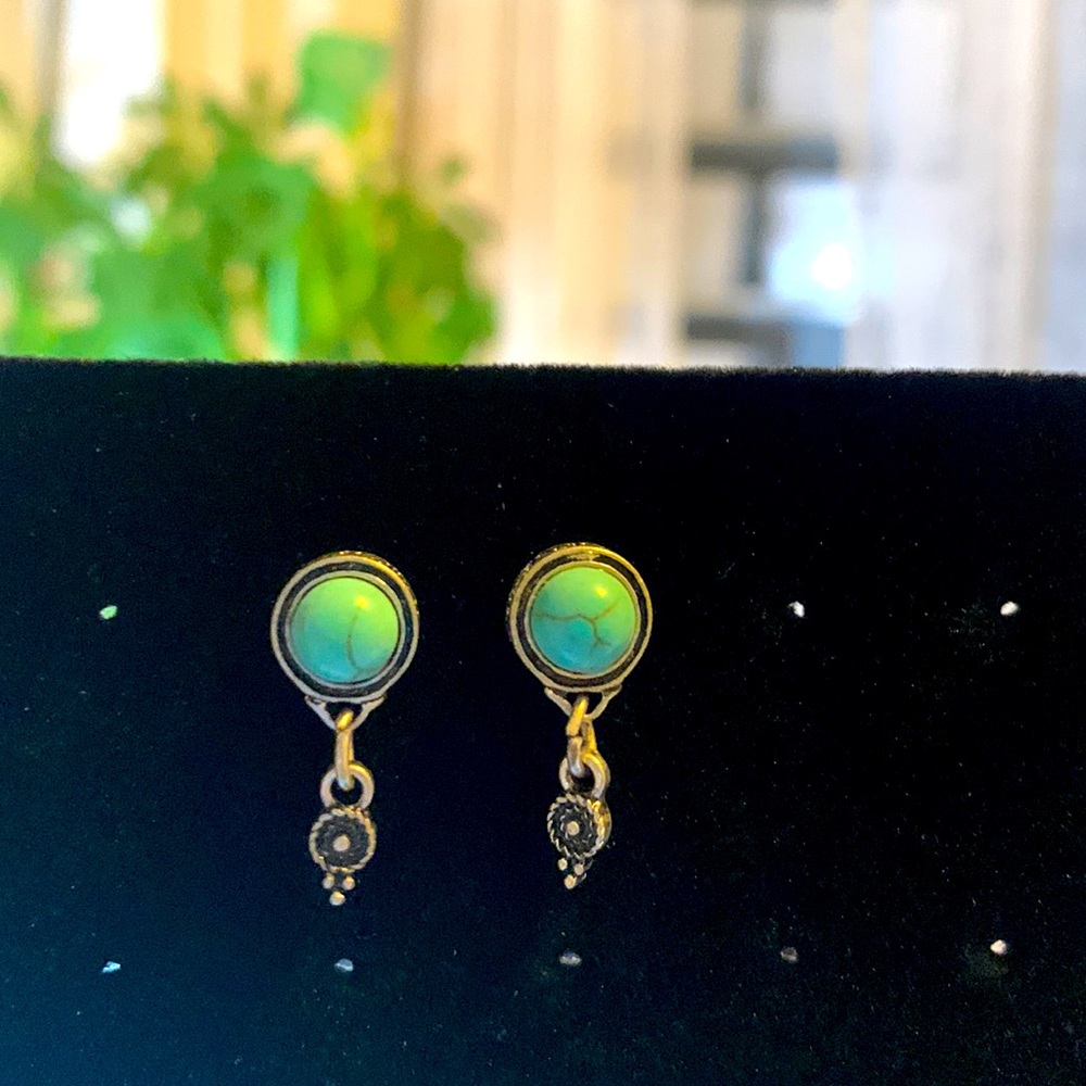 Turquoise color and silver tone earrings, nickel sensitive approx 1/4”w x 3/4”l